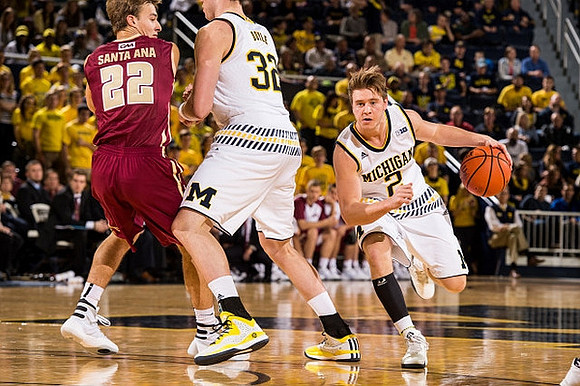 Ricky Doyle (32) and Spike Albrecht (2)