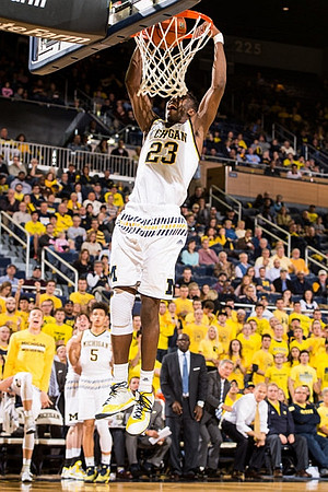 Caris LeVert (23) and D.J. Wilson (5)