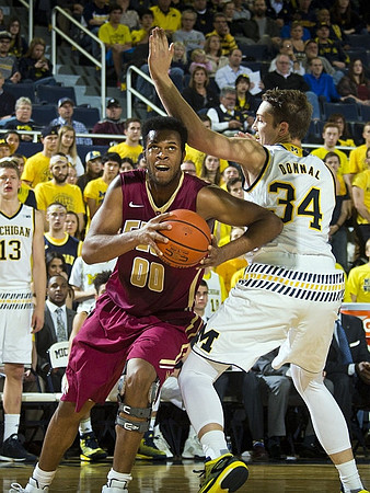 Moritz Wagner (13) and Mark Donnal (34)