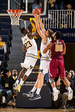Caris LeVert (23) and Moritz Wagner (13)