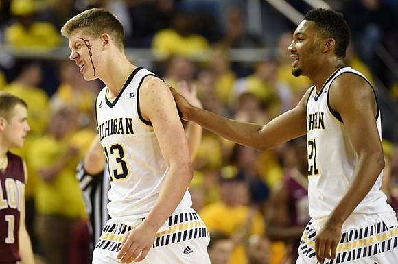 Moritz Wagner (13) and Zak Irvin (21)