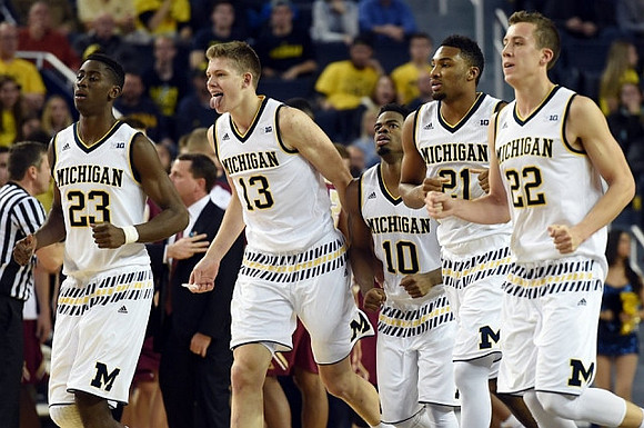 Caris LeVert (23), Moritz Wagner (13), Derrick Walton Jr. (10), Zak Irvin (21), and Duncan Robinson (22)