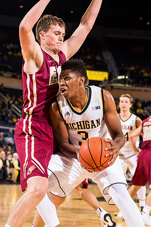 Kameron Chatman (3) and Mark Donnal (34)
