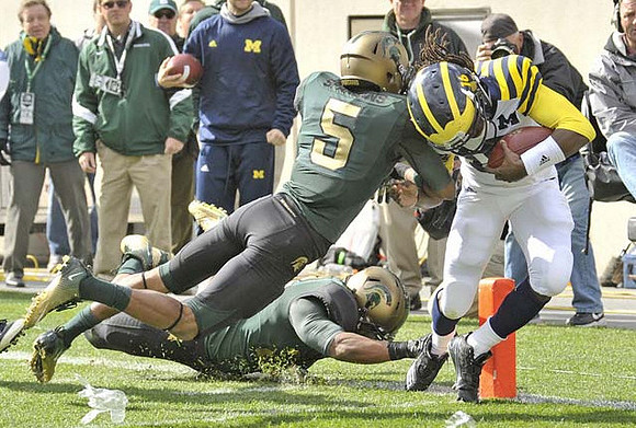 Denard Robinson (16)
