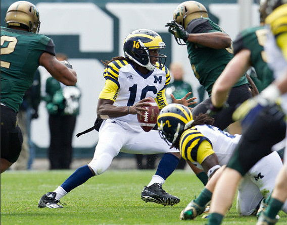 Denard Robinson (16) and Vincent Smith (2)