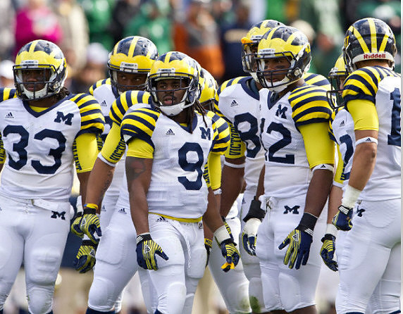 Stephen Hopkins (33), Martavious Odoms (9), J.B. Fitzgerald (42), and Tony Anderson (17)