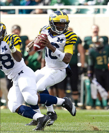 Denard Robinson (16) and Fitzgerald Toussaint (28)