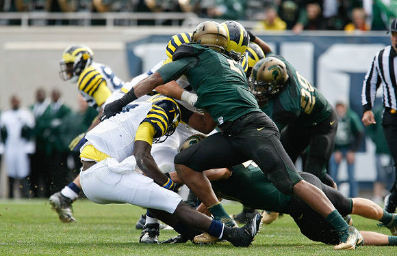 Devin Gardner (7) and Kevin Koger (86)