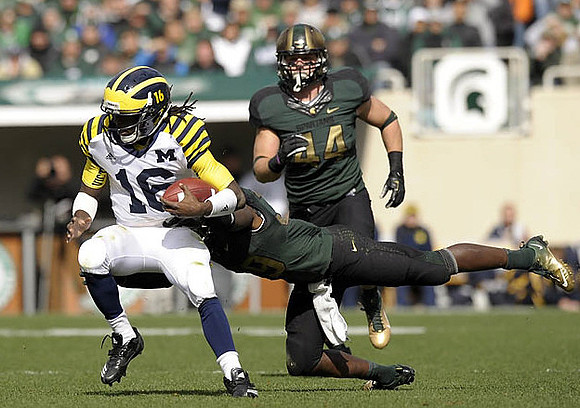 Denard Robinson (16)