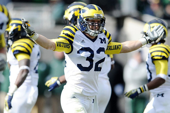 Vincent Smith (2), Kevin Koger (86), and Jordan Kovacs (32)