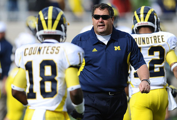 Blake Countess (18), Brady Hoke, and Roy Roundtree (12)