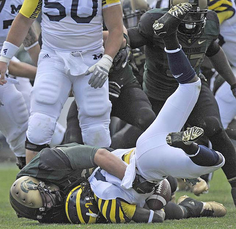 Vincent Smith (2) and David Molk (50)