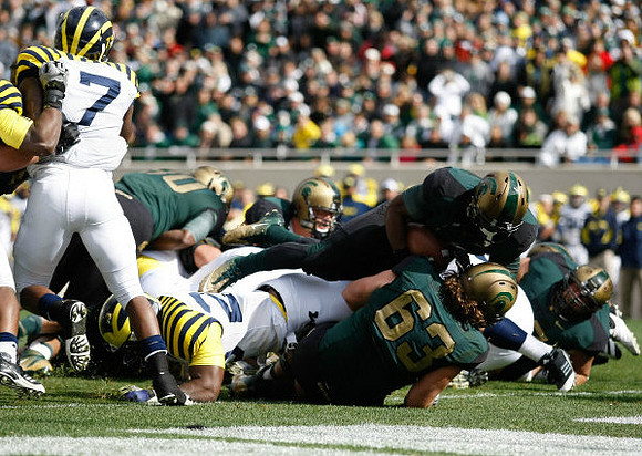Brandin Hawthorne (7) and Kenny Demens (25)
