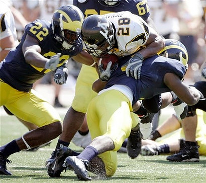 Stevie Brown, Jamar Adams, and Terrance Taylor