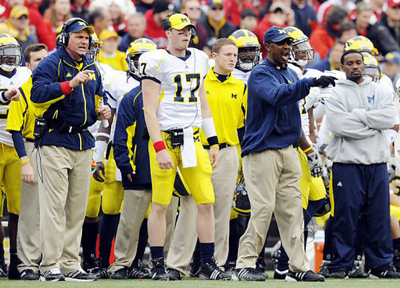 Rich Rodriguez, David Cone (17), and Fred Jackson