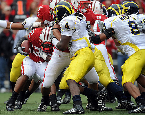 Jordan Kovacs (32), Brandon Smith (4), and Jonas Mouton (8)