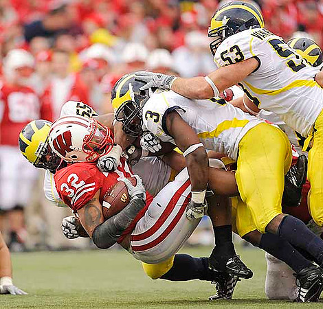 Brandon Graham (55), Stevie Brown (3), and Ryan Van Bergen (53)