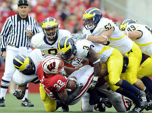 Brandon Graham (55), Jonas Mouton (8), Stevie Brown (3), Ryan Van Bergen (53), and Tim North (89)