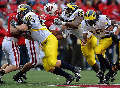 David Moosman (60), Patrick Omameh (65), and Denard Robinson (16)