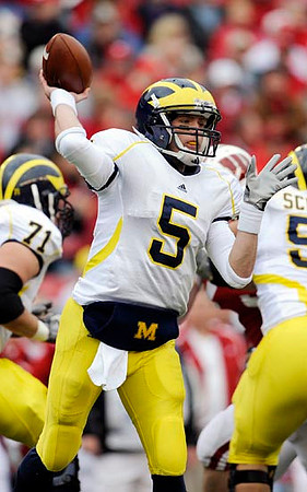 Mark Ortmann (71), Tate Forcier (5), and Stephen Schilling (52)