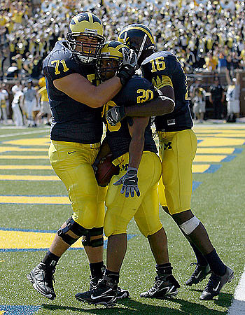 Mark Ortmann, Michael Hart, and Adrian Arrington