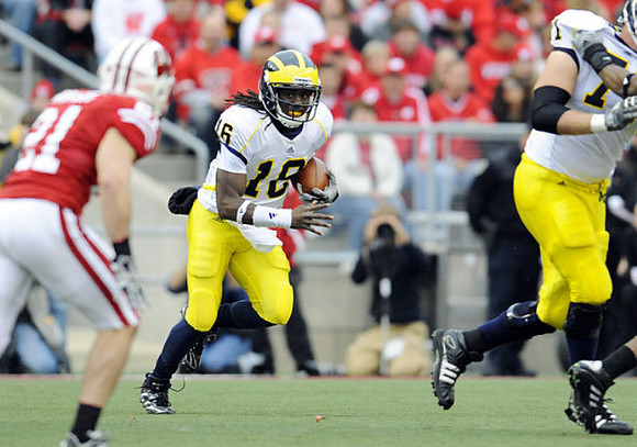 Denard Robinson (16) and Mark Ortmann (71)
