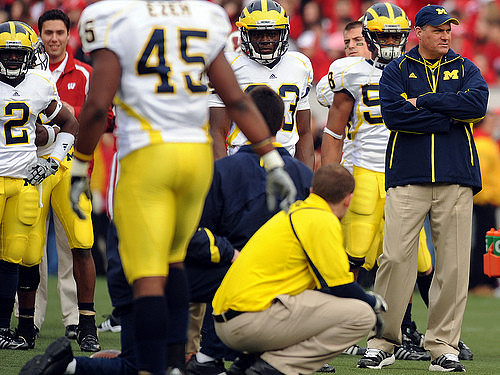 Vincent Smith (2), Obi Ezeh (45), and Rich Rodriguez