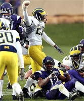 Ryan Mundy (26), Pierre Rembert (20), and Roy Manning (58)