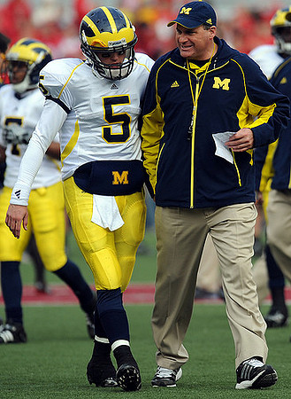 Tate Forcier (5) and Rich Rodriguez