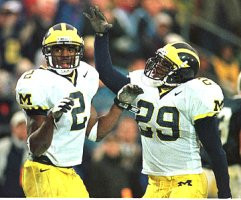 Charles Woodson (2) and Marcus Ray (29)
