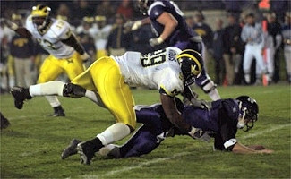 Pierre Woods (99) and Larry Stevens (13)