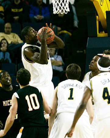 DeShawn Sims (34), Stu Douglass (1), Kelvin Grady (44), and Jevohn Shepherd (22)