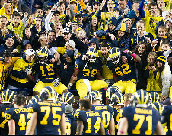Devin Funchess (19), Thomas Rawls (38), Royce Jenkins-Stone (52), Dylan Esterline (42), Michael Schofield (75), Josh Furman (14), Kristian Mateus (70), and Ben Braden (71)