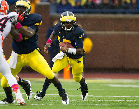 Denard Robinson (16) and Brandon Moore (87)