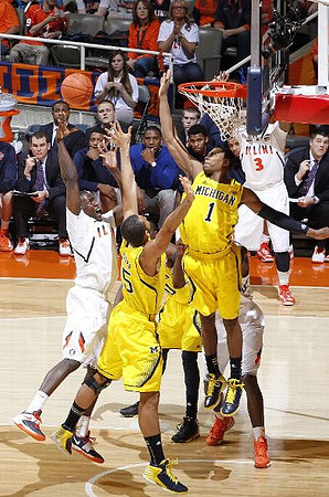 Jon Horford (15) and Glenn Robinson III (1)
