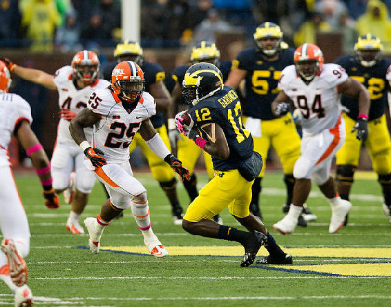 Devin Gardner (12), Elliott Mealer (57), and Ricky Barnum (52)