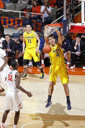 Nik Stauskas (11) and Mitch McGary (4)