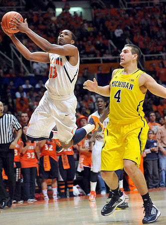 Glenn Robinson III (1) and Mitch McGary (4)