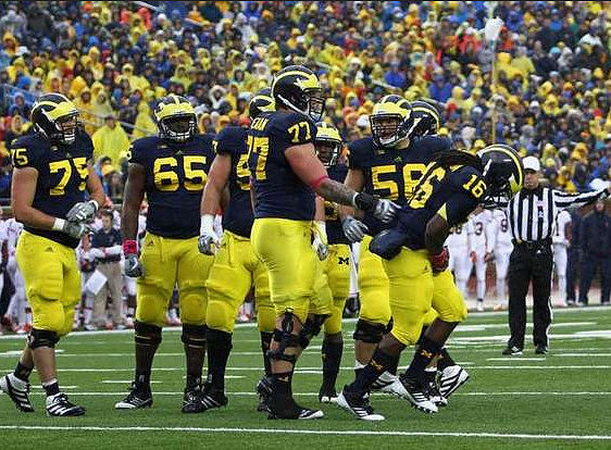 Michael Schofield (75), Patrick Omameh (65), Elliott Mealer (57), Taylor Lewan (77), Joey Burzynski (56), and Denard Robinson (16)
