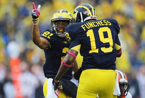 Roy Roundtree (21) and Devin Funchess (19)