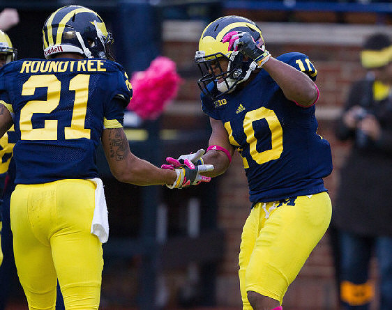 Roy Roundtree (21) and Jeremy Gallon (10)
