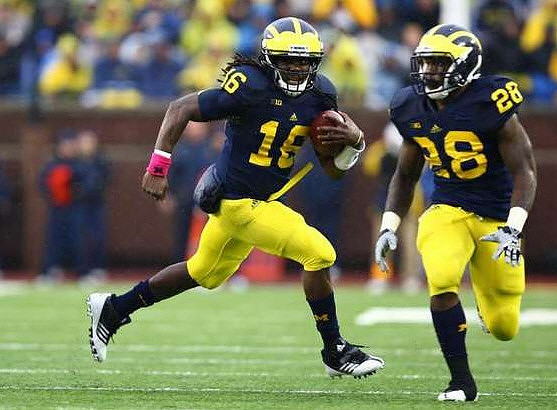Denard Robinson (16) and Fitzgerald Toussaint (28)
