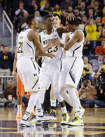 Zak Irvin (21), Caris LeVert (23), Ricky Doyle (32), and Aubrey Dawkins (24)