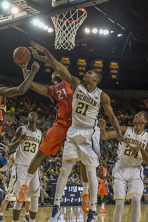 Caris LeVert (23), Zak Irvin (21), and Aubrey Dawkins (24)