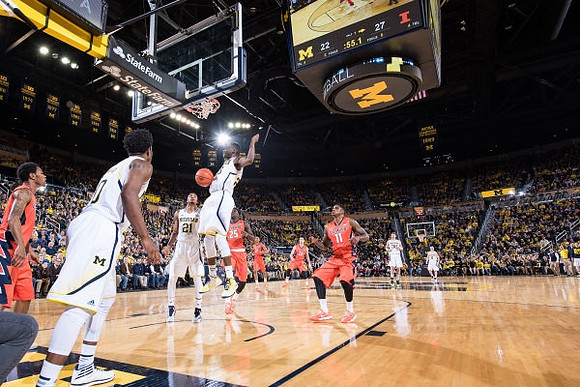 Derrick Walton Jr. (10), Zak Irvin (21), Caris LeVert (23), Ricky Doyle (32), and Spike Albrecht (2)