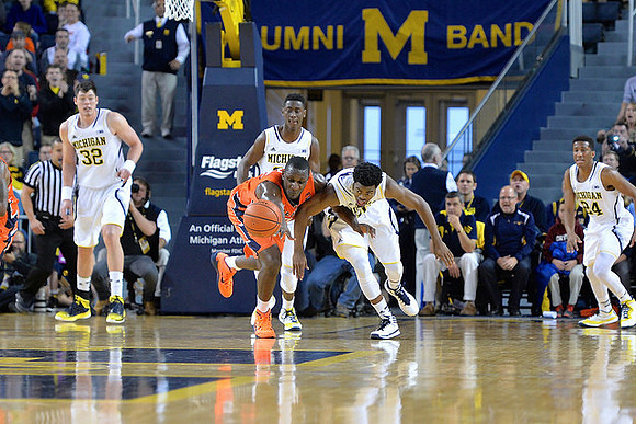 Ricky Doyle (32), Caris LeVert (23), Derrick Walton Jr. (10), and Aubrey Dawkins (24)