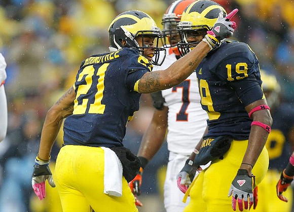 Roy Roundtree (21) and Devin Funchess (19)
