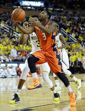 Kameron Chatman (3) and Caris LeVert (23)