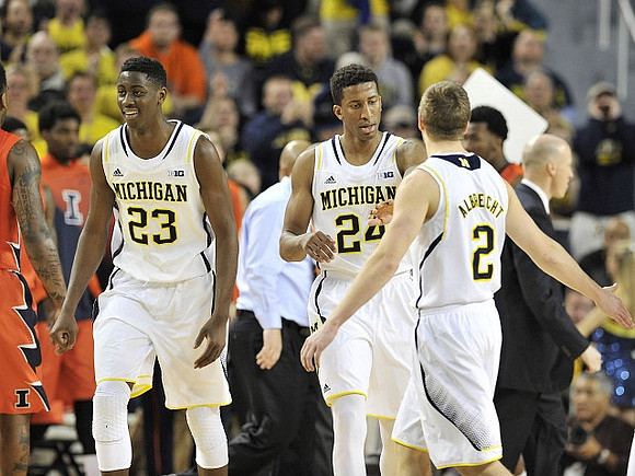 Caris LeVert (23), Aubrey Dawkins (24), and Spike Albrecht (2)