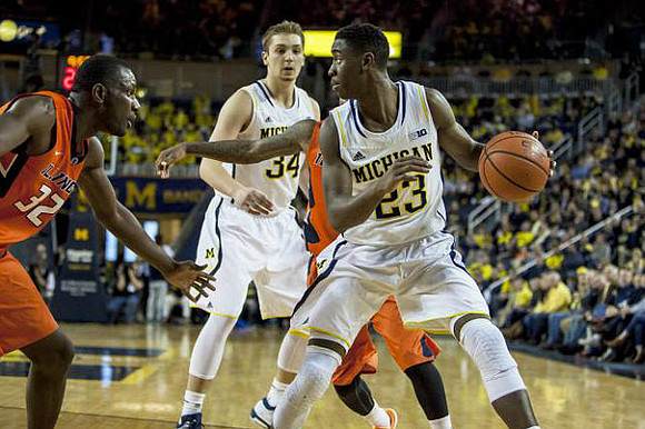 Mark Donnal (34) and Caris LeVert (23)